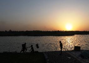 IRAQ-BAGHDAD-TIGRIS RIVER-SUNSET-SCENERY