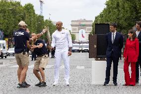 Olympic Torch Relay Along the Champs-Elysees Avenue - Paris