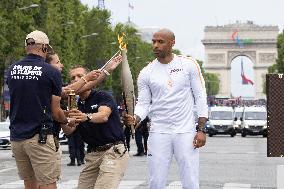 Olympic Torch Relay Along the Champs-Elysees Avenue - Paris