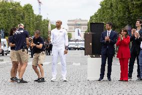 Olympic Torch Relay Along the Champs-Elysees Avenue - Paris