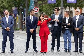 Olympic Torch Relay Along the Champs-Elysees Avenue - Paris