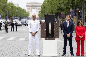 Olympic Torch Relay Along the Champs-Elysees Avenue - Paris