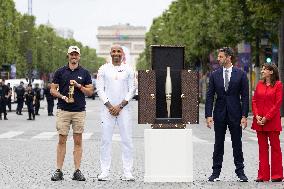 Olympic Torch Relay Along the Champs-Elysees Avenue - Paris