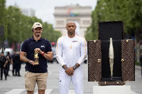 Olympic Torch Relay Along the Champs-Elysees Avenue - Paris