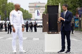 Olympic Torch Relay Along the Champs-Elysees Avenue - Paris