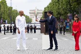 Olympic Torch Relay Along the Champs-Elysees Avenue - Paris