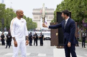 Olympic Torch Relay Along the Champs-Elysees Avenue - Paris