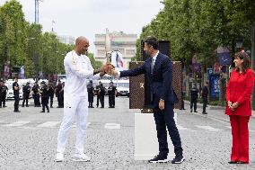 Olympic Torch Relay Along the Champs-Elysees Avenue - Paris