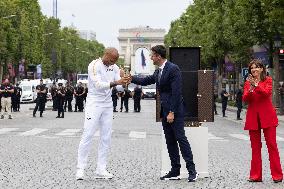 Olympic Torch Relay Along the Champs-Elysees Avenue - Paris