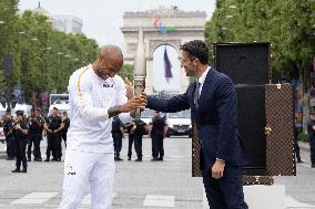 Olympic Torch Relay Along the Champs-Elysees Avenue - Paris