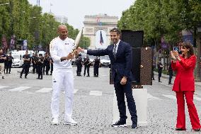 Olympic Torch Relay Along the Champs-Elysees Avenue - Paris