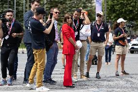 Olympic Torch Relay Along the Champs-Elysees Avenue - Paris