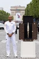 Olympic Torch Relay Along the Champs-Elysees Avenue - Paris