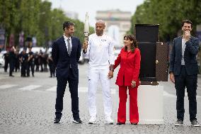 Olympic Torch Relay Along the Champs-Elysees Avenue - Paris