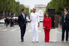 Olympic Torch Relay Along the Champs-Elysees Avenue - Paris