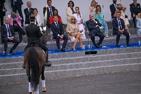 Olympic flame during the annual Bastille Day military parade - Paris