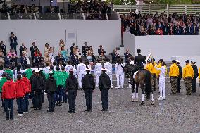 Olympic flame during the annual Bastille Day military parade - Paris