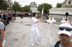 Olympic Torch flame Relay on the Bastille Place - Paris