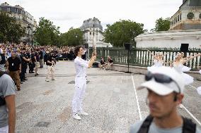 Olympic Torch flame Relay on the Bastille Place - Paris