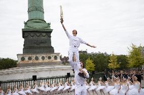 Olympic Torch flame Relay on the Bastille Place - Paris