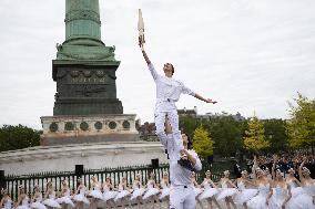 Olympic Torch flame Relay on the Bastille Place - Paris