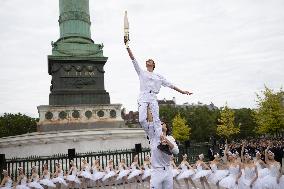 Olympic Torch flame Relay on the Bastille Place - Paris