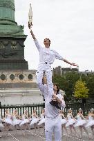 Olympic Torch flame Relay on the Bastille Place - Paris