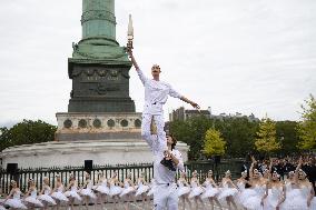 Olympic Torch flame Relay on the Bastille Place - Paris