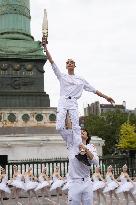 Olympic Torch flame Relay on the Bastille Place - Paris