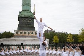 Olympic Torch flame Relay on the Bastille Place - Paris