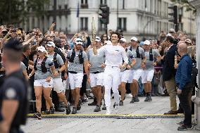 Olympic Torch flame Relay on the Bastille Place - Paris