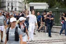 Olympic Torch flame Relay on the Bastille Place - Paris