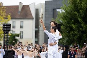 Olympic Torch flame Relay on the Bastille Place - Paris