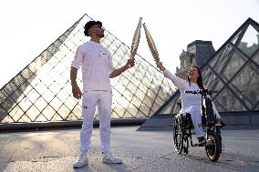 Olympic Torch Relay at the Louvre Pyramid- Paris