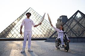 Olympic Torch Relay at the Louvre Pyramid- Paris