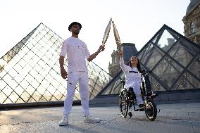 Olympic Torch Relay at the Louvre Pyramid- Paris