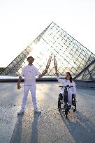 Olympic Torch Relay at the Louvre Pyramid- Paris