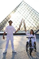 Olympic Torch Relay at the Louvre Pyramid- Paris