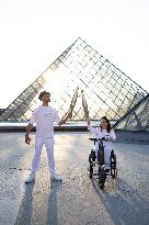 Olympic Torch Relay at the Louvre Pyramid- Paris