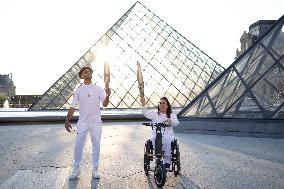 Olympic Torch Relay at the Louvre Pyramid- Paris