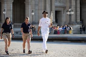 Olympic Torch Relay at the Louvre Pyramid- Paris