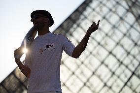 Olympic Torch Relay at the Louvre Pyramid- Paris