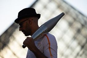 Olympic Torch Relay at the Louvre Pyramid- Paris