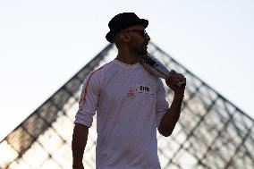 Olympic Torch Relay at the Louvre Pyramid- Paris