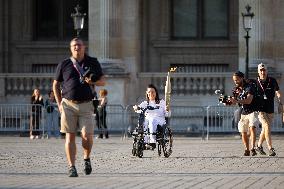 Olympic Torch Relay at the Louvre Pyramid- Paris