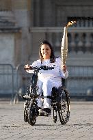 Olympic Torch Relay at the Louvre Pyramid- Paris