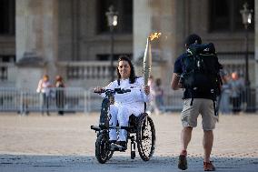 Olympic Torch Relay at the Louvre Pyramid- Paris