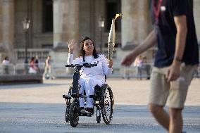 Olympic Torch Relay at the Louvre Pyramid- Paris