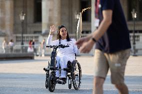 Olympic Torch Relay at the Louvre Pyramid- Paris