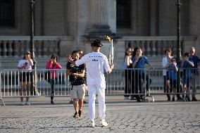 Olympic Torch Relay at the Louvre Pyramid- Paris